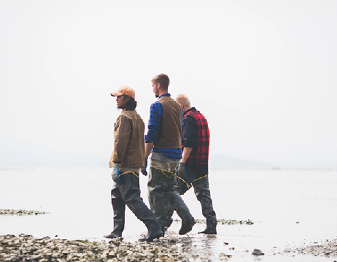 three-fishermen-walking-beach